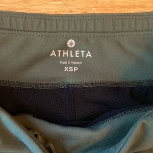 Athleta Olive green skort with side pockets xs 14” with built in shorts